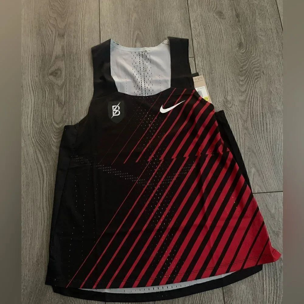 Nike woman’s size S running track shirt